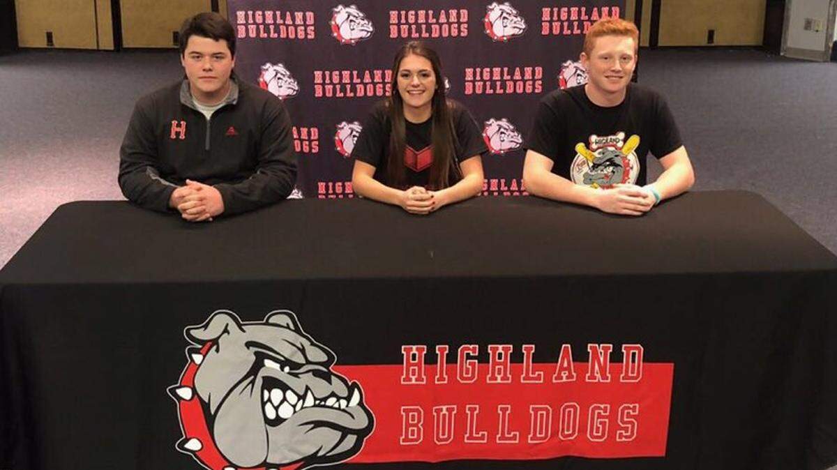 Athletes from Highland High School last week signed national letters of intent to continue their sports and academic careers in college. Payne Waldmand, far left, will be competing in baseball while studying political science at Danville Area Community College for the 2019-2020 school year. Kate Marti, center, will be competing in cross country and track and field at Maryville University while studying nursing for the 2019-2020 school year. Jacob Willis will be competing in baseball while studying business at Kaskaskia College for the 2019-2020 school year.
