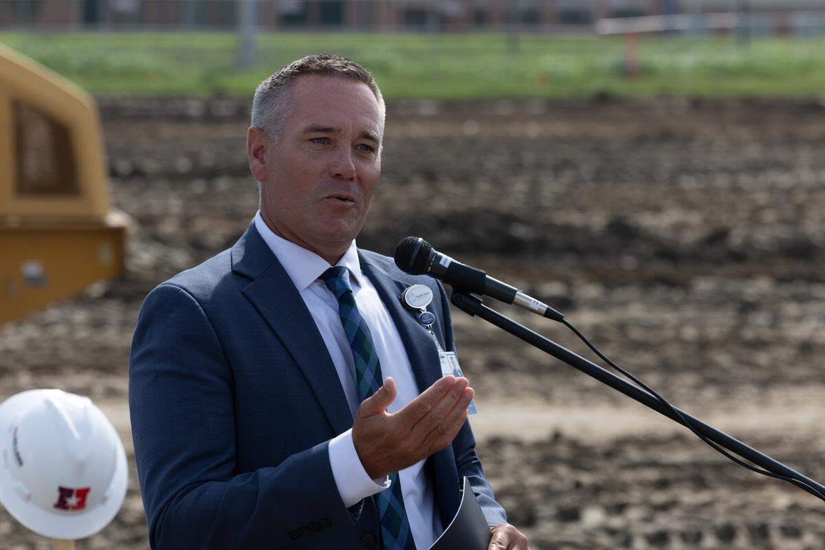 HSHS St. Elizabeth CEO Chris Clay thanks investors and board members during a groundbreaking for HSHS St. Elizabeth’s for a new surgical center and office building.
