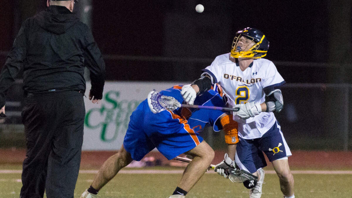 O'Fallon's Braden Gaab (2) takes the face-off against Clayton.