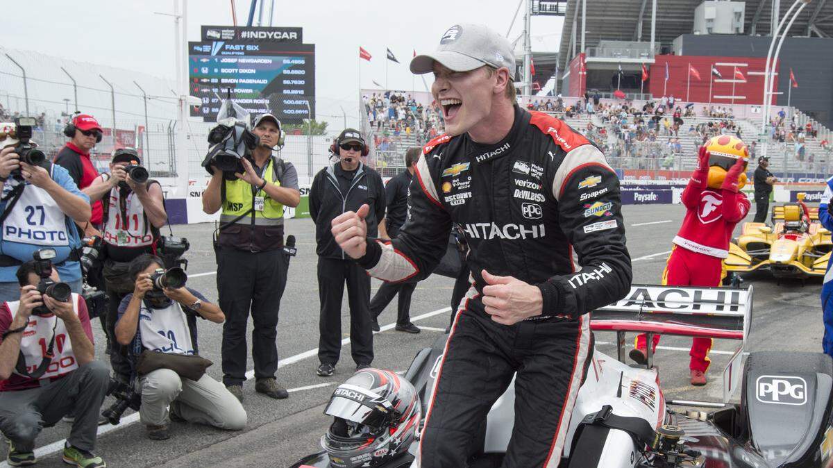 Josef Newgarden celebrates after posting the fastest time during qualifying for the IndyCar auto race in Toronto on July 14. He was the winner of last year’s Bommarito 500 at Gateway Motorsports Park in Madison and is the defending IndyCar points champion. NASCAR and IndyCar are headed to World Wide Technology Raceway in Madison for one race filled day Aug. 30.