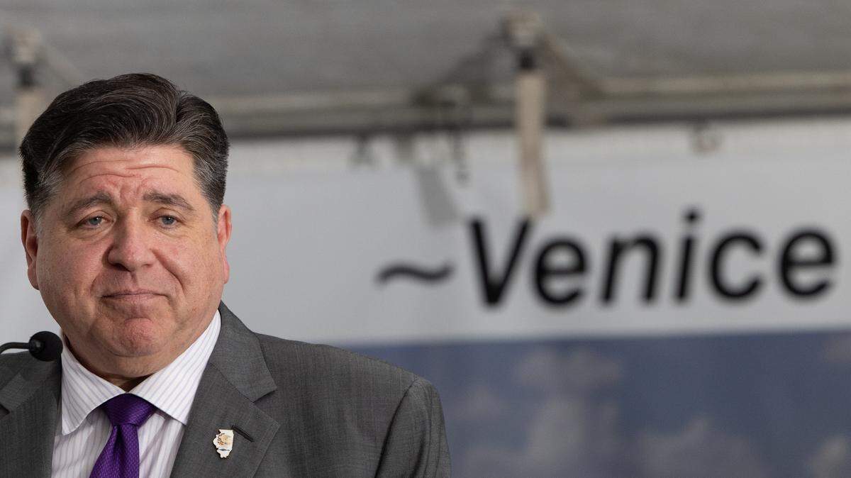 Ill. Gov. J.B. Pritzker speaks during a groundbreaking ceremony for a future grocery store in Venice, Ill.