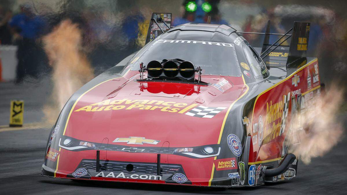 In this photo provided by the NHRA, Courtney Force races to the Funny Car provisional qualifying lead on Friday, Sept. 14, 2018, at the annual Dodge NHRA Nationals at Maple Grove Raceway in Reading, Pa. Force also has the lead after the first day of qualifying at the Midwest Nationals at Gateway Motorsports Park in Madison.