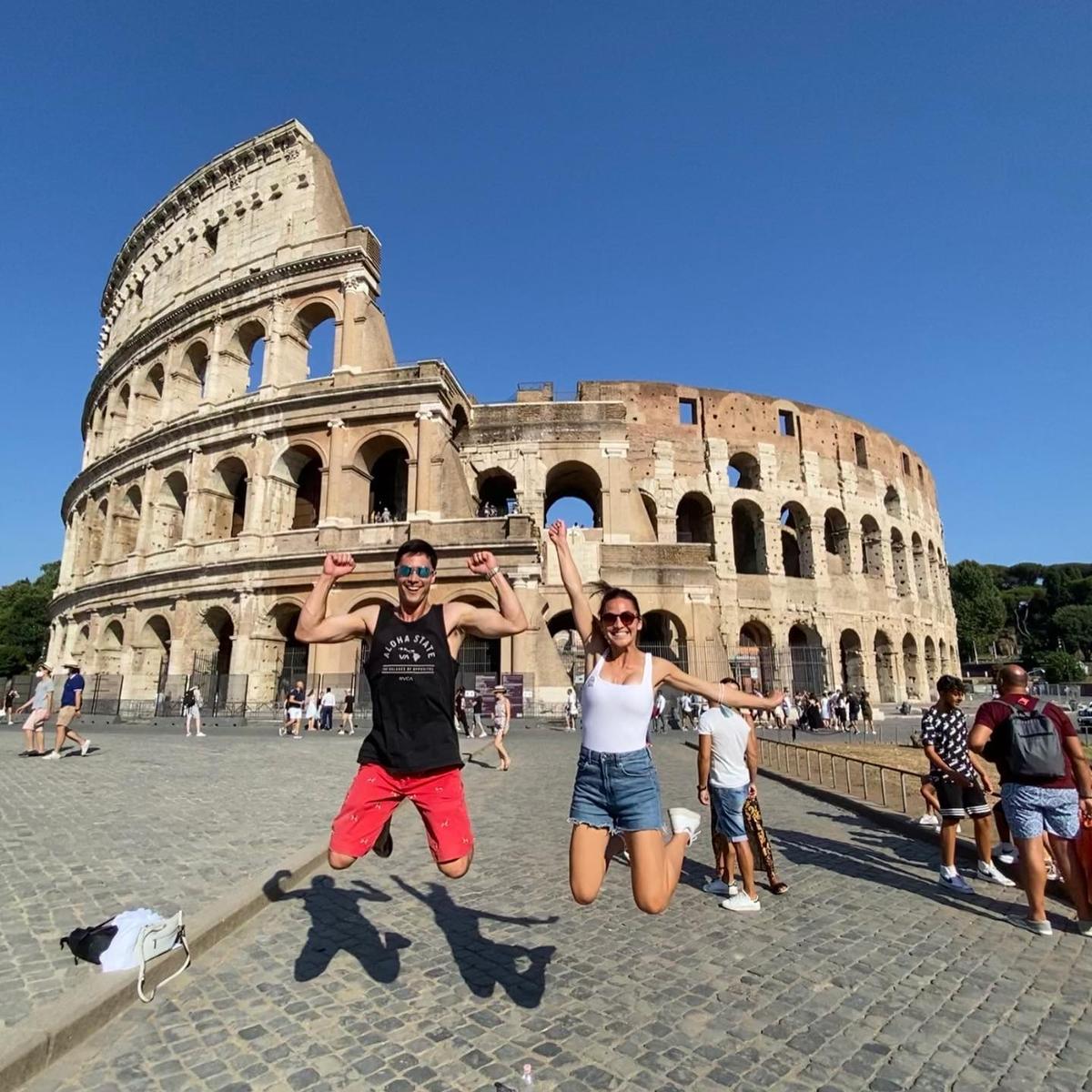 U.S. Air Force Capt. Jonathan Buckingham, 618th Air Operations Center Chief of Short Range Allocations with his sister in front of the Colosseum in Rome, Italy.