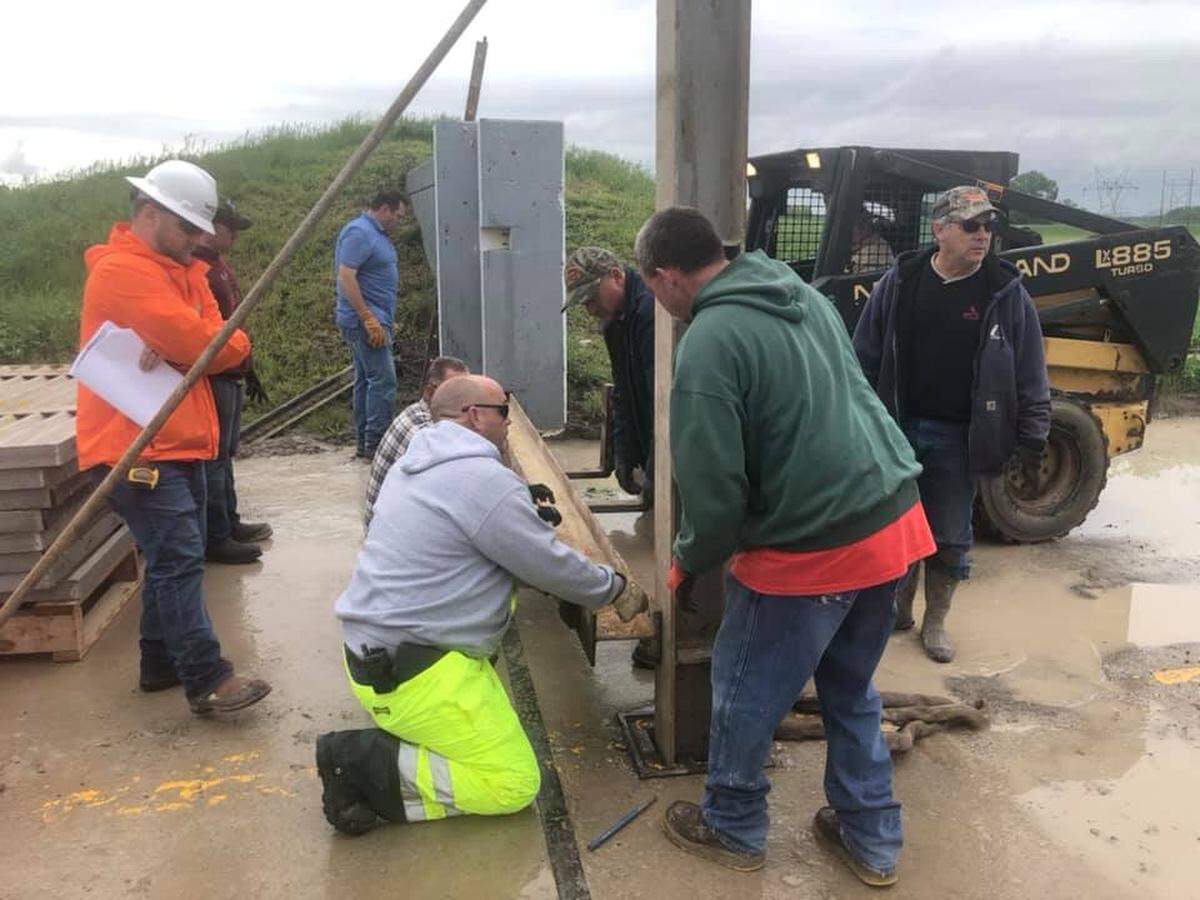Flood gates were installed on the Prairie Du Pont Levee at Triple Lakes Road on Saturday morning in St. Clair County.
