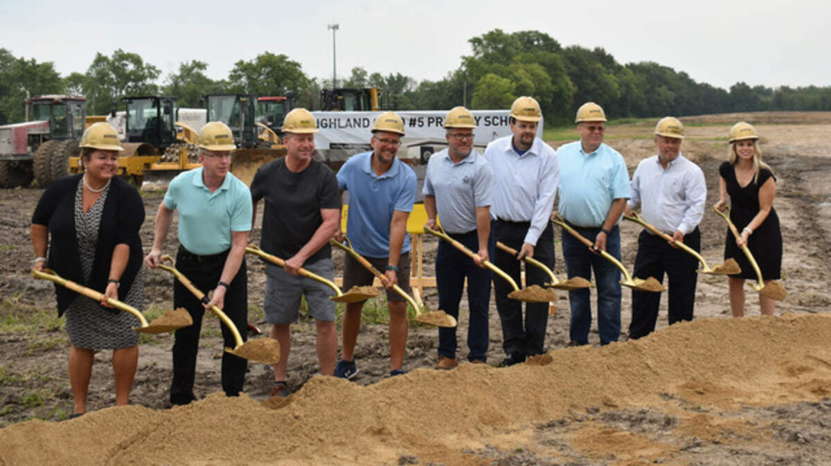 Pictured from left to right: Highland Primary Julie Korte, former board member Robert Miller, board member Steve Lanxon, board president Aaron Schuster, board member Jeff Schaible, board member Chris Goodwin, board member Jim Johnson, Superintendent Mike Sutton, Assistant Principal Amanda Mullaney. Unable to be present: board members Zach Lewis and Lora Miles. Photo courtesy of Highland District 5