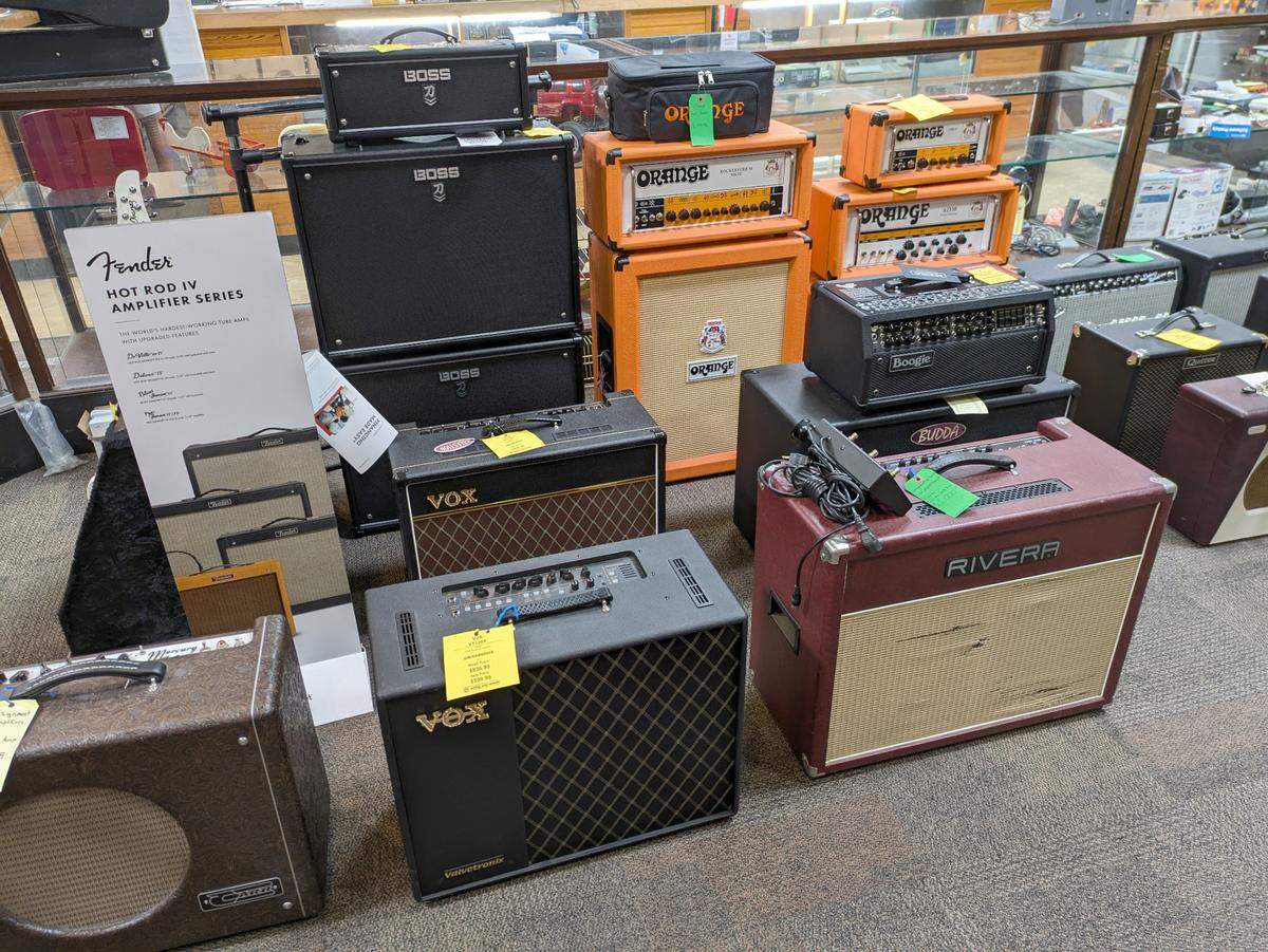 Different brands of amplifiers in various sizes and colors are available at Swing City Music.