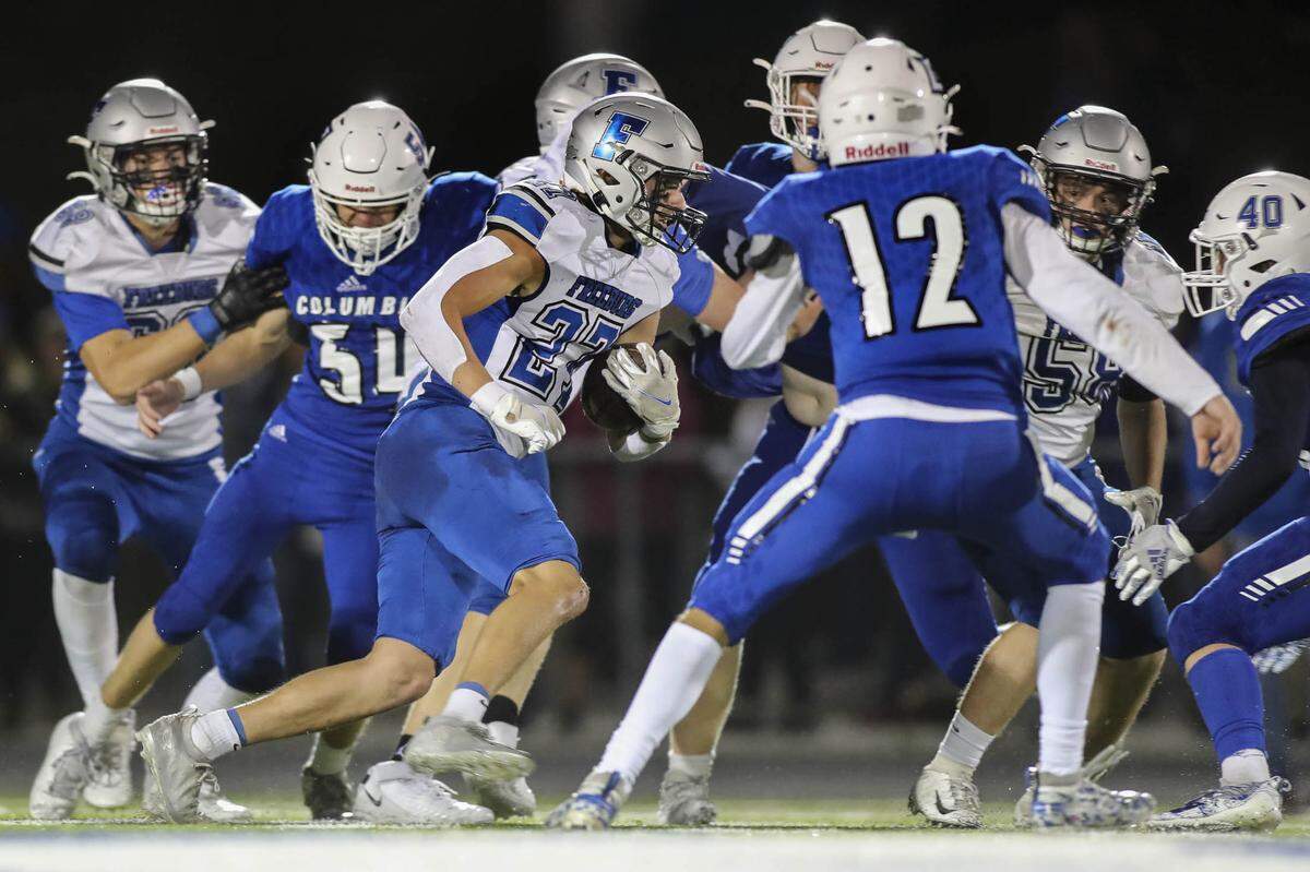 Freeburg’s Caleb Loftus (27) carries the ball into a stingy Columbia defense during Friday night’s Cahokia Conference game. The Midgets ultimately fell to the Eagles 24-0.