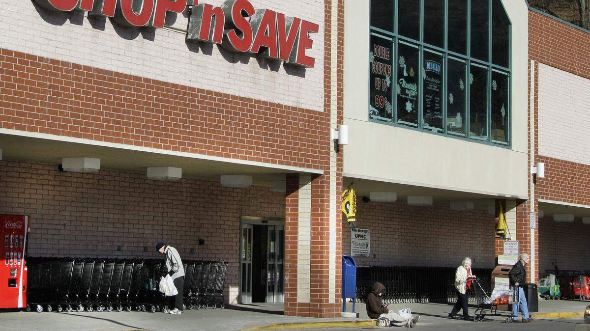 In this Jan. 9, 2012, file photo, customers exit a Shop ‘n Save grocery store in Mount Lebanon, Pa.