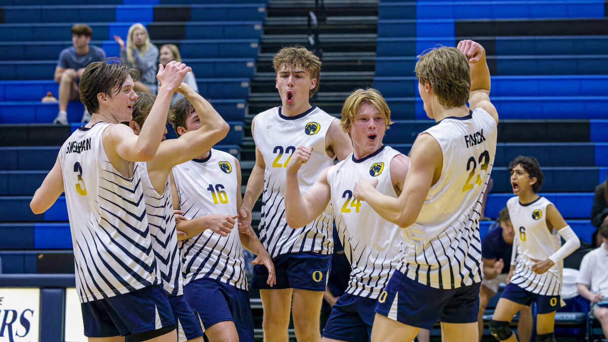 O’Fallon’s Matthew Hettenhausen celebrates with teammates after the win against Belleville East on Thursday, May 11. The visiting Panthers prevailed 25-21, 25-19 in a showdown between two of the metro-east’s top boys volleyball teams. O’Fallon ultimately placed fourth in the IHSA state tournament at Hoffman Estates High School, defeating Barrington before losing the next two matches to LaGrange and Oak Park. The Panthers finished their tremendous season at 31-8. “I would like to see central Illinois and more schools around here start getting boys volleyball. Once people see what a great sport it is, it would become more competitive,” veteran O’Fallon coach Amy Sheehan said.