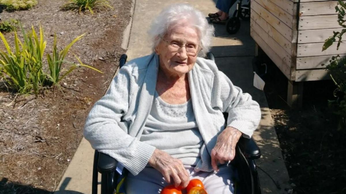 Electa Leitch, a resident at Hitz Memorial Home, enjoys the fresh garden produce from the Hitz Garden. At 103 years old, Electa has had her share of gardening and is very good at finding the best tomatoes on the vines.