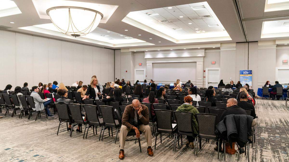 Gerald Young, 62, of St. Louis, anxiously waits for number to be called during a hiring event by Illinois Department of Children & Family Services (DCFS) on Wednesday, March 27, 2024, at Fountains Conference Center in Fairview Heights. The event drew over 500 people who came to apply for potential work.