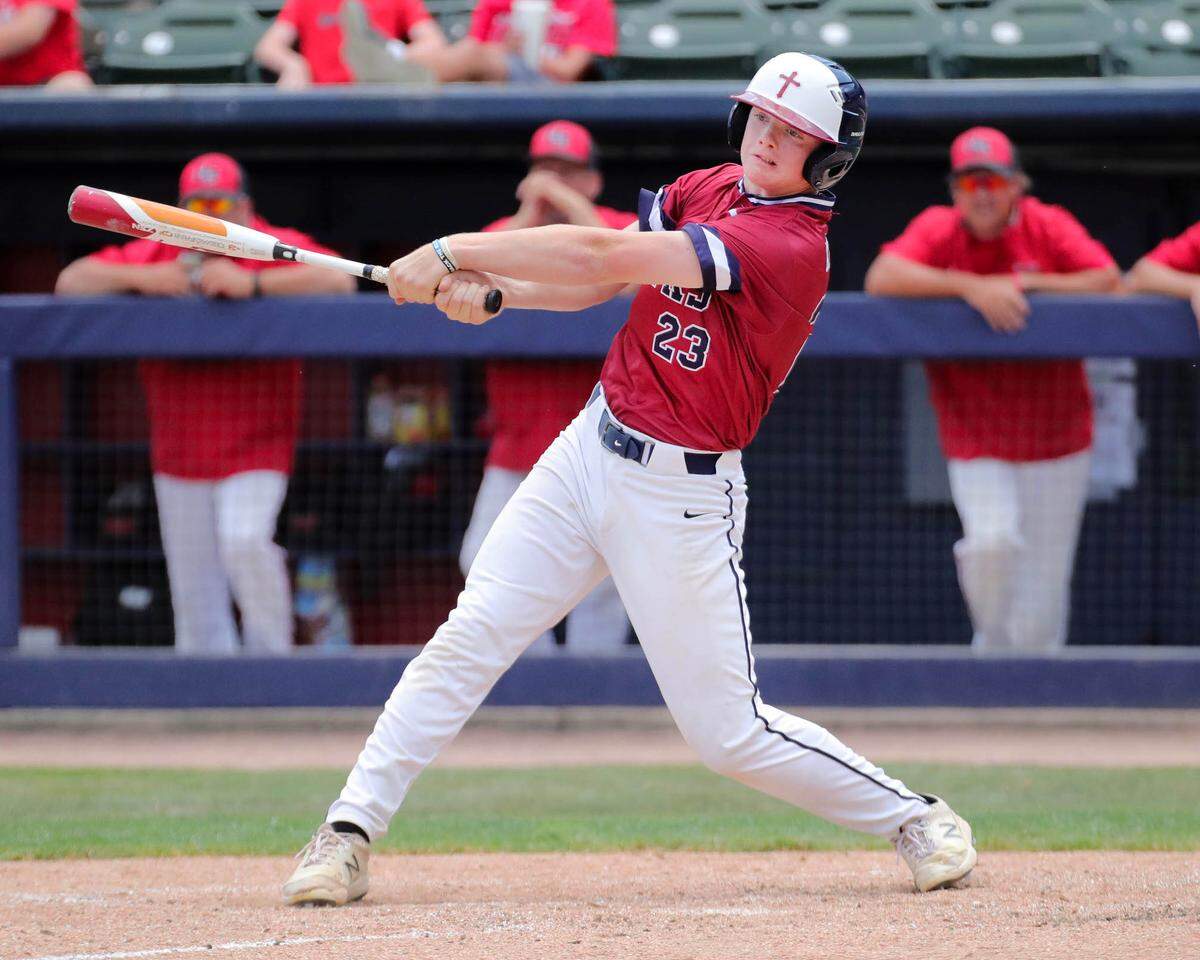 Gibault’s Jack Keeven doubles during Saturday’s IHSA Class 1A state championship game against Henry H-Senachwine at Dozer Park in Peoria. Gibault went on to an 8-0 win to secure the state crown.