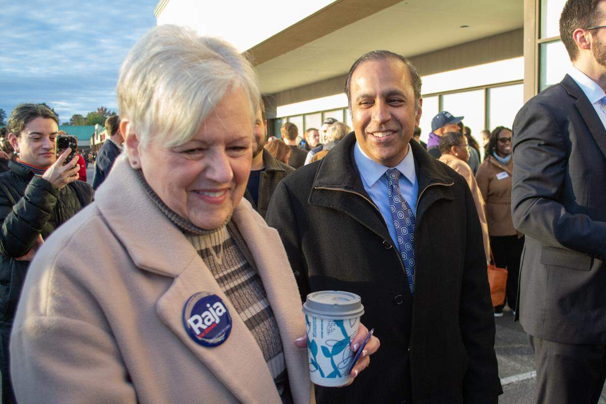 U.S. Senate candidate Raja Krishnamoorthi talks to a supporter while in line to file nominating petitions on Monday, Oct. 27, 2025. Krishnamoorthi is campaigning for the seat left open by senior Democratic Senator Dick Durbin, who announced earlier this year that he would not seek another term.