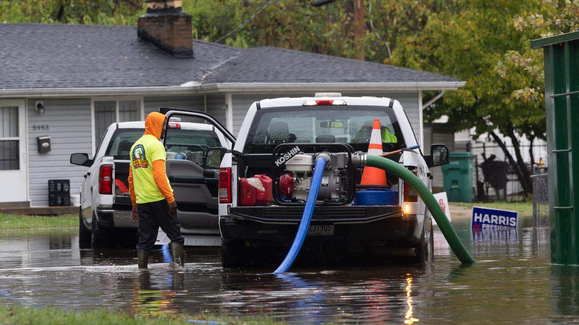 Cahokia Heights city workers pump water off of flooded streets on Election Day, Nov. 5, 2024.