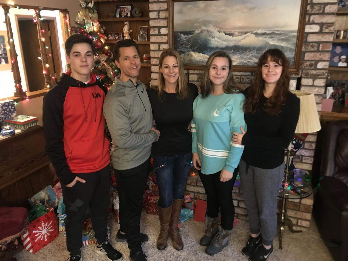 AJ Mitchell poses on Christmas morning with his parents, Allison and Aaron, and sisters, Andrea and Addison, in 2017. They now live in Los Angeles but still consider Belleville home.