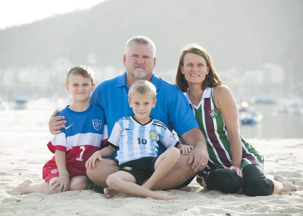 Col. Leslie Maher poses on a beach in Hawaii with her husband, Ed Maher, and sons, Luke and Nick, in 2015. The boys are now 11 and 10, respectively.