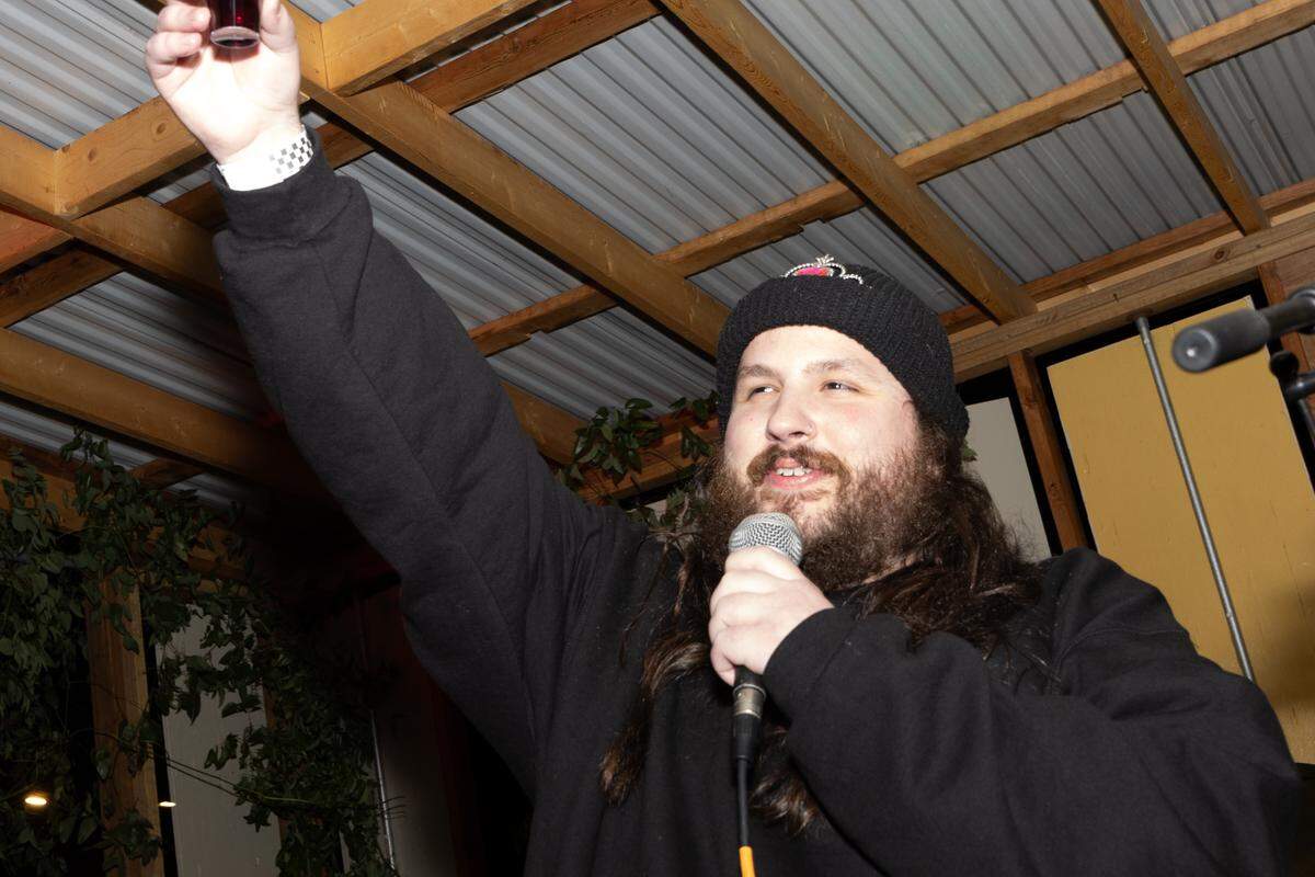 Richard Summit, who serves as the “face” of the Nunnery, raises a toast to the alternative community during a midnight toast at Spaces. It was the first event co-hosted between The Nunnery and another downtown Belleville venue.