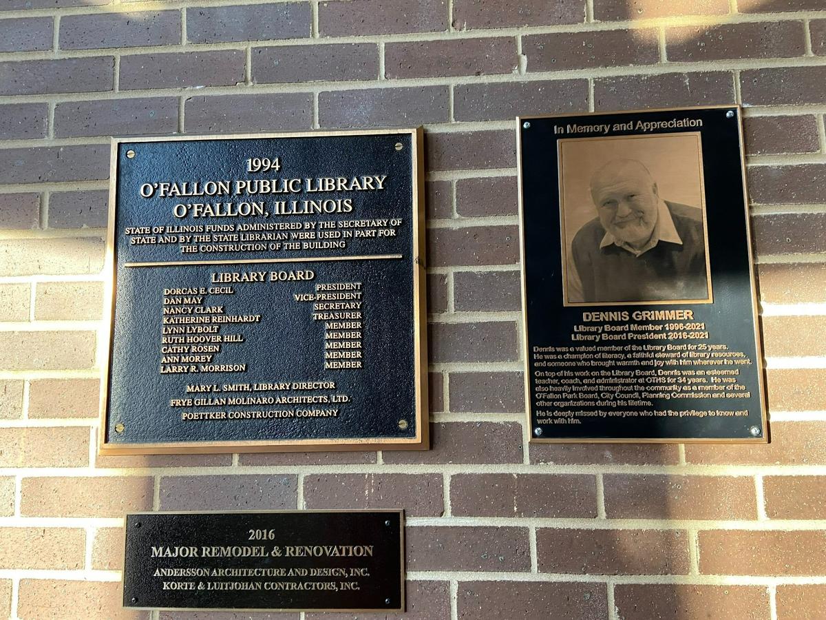 Dennis Grimmer, one of O’Fallon’s finest citizens known for his life’s work in education and tireless community efforts until his death in March 2021, has been honored by the city with a lasting tribute. A memorial plaque now hangs at the O’Fallon Public Library, for he played an important role in its development during the 25 years he served on the board of trustees, the last five as president.