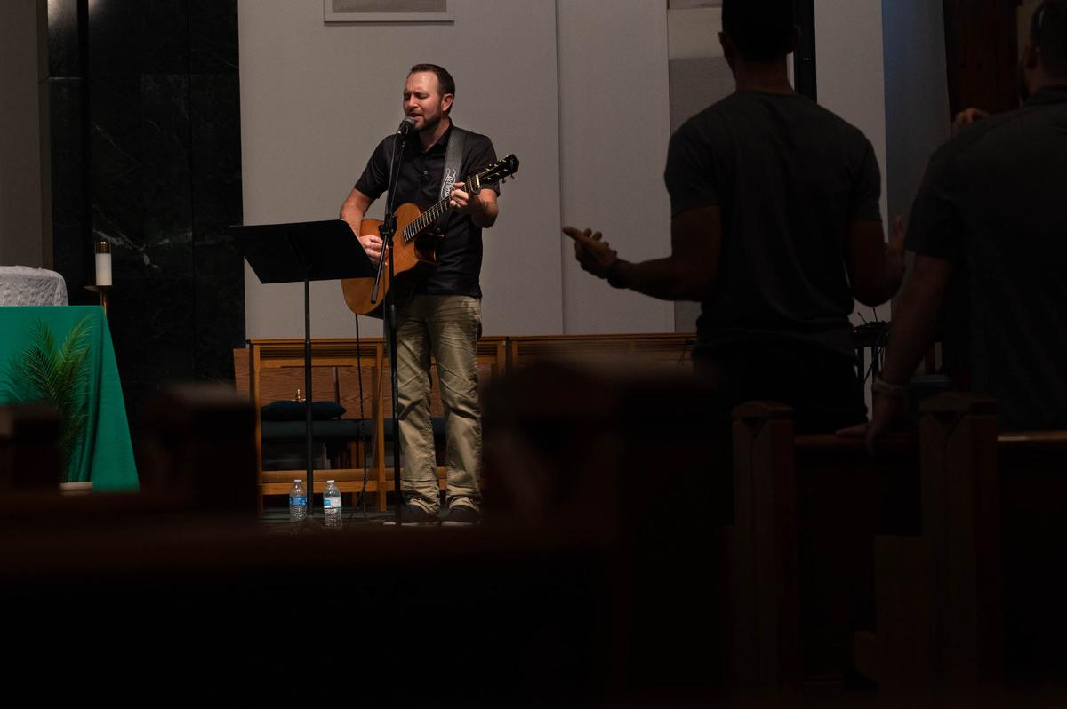 Trent Ketchum, Mercy’s Door Community Church member, plays the guitar during a Touch of Faith service on Scott Air Force Base. The chaplain corps is looking to take the Touch of Faith Initiative Air Force-wide, and the journey starts as leaders look for ways to support spiritual resiliency for Airmen across the service.