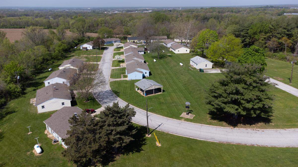 This drone photo shows a loop lined with small frame homes on Turkey Hill in rural Belleville that housed adults with developmental disabilities for 40 years as part of a St. Clair Associated Vocational Enterprises program.