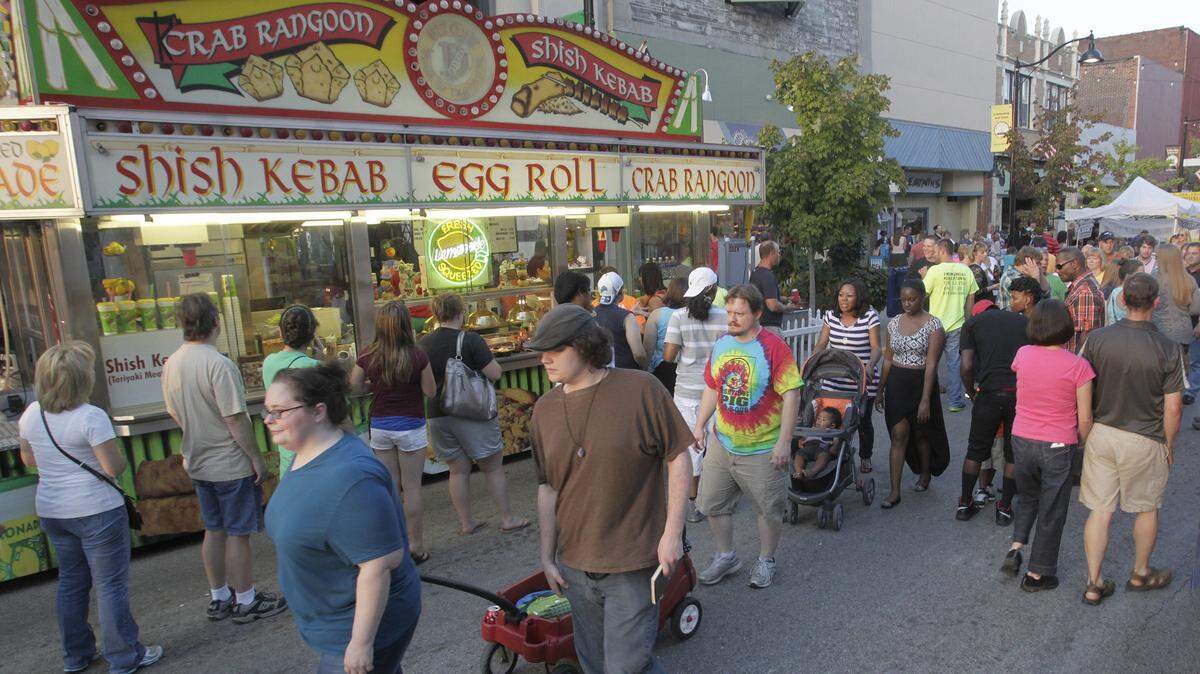 People browse the food stands at a past Oktoberfest on East Main Street in downtown Belleville.