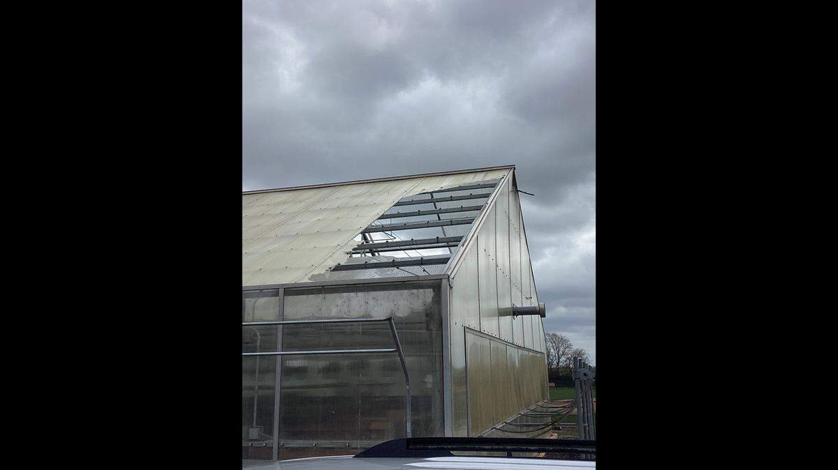 The National Weather Service released this photo of a building that was damaged during a tornado Sunday night in Waterloo.