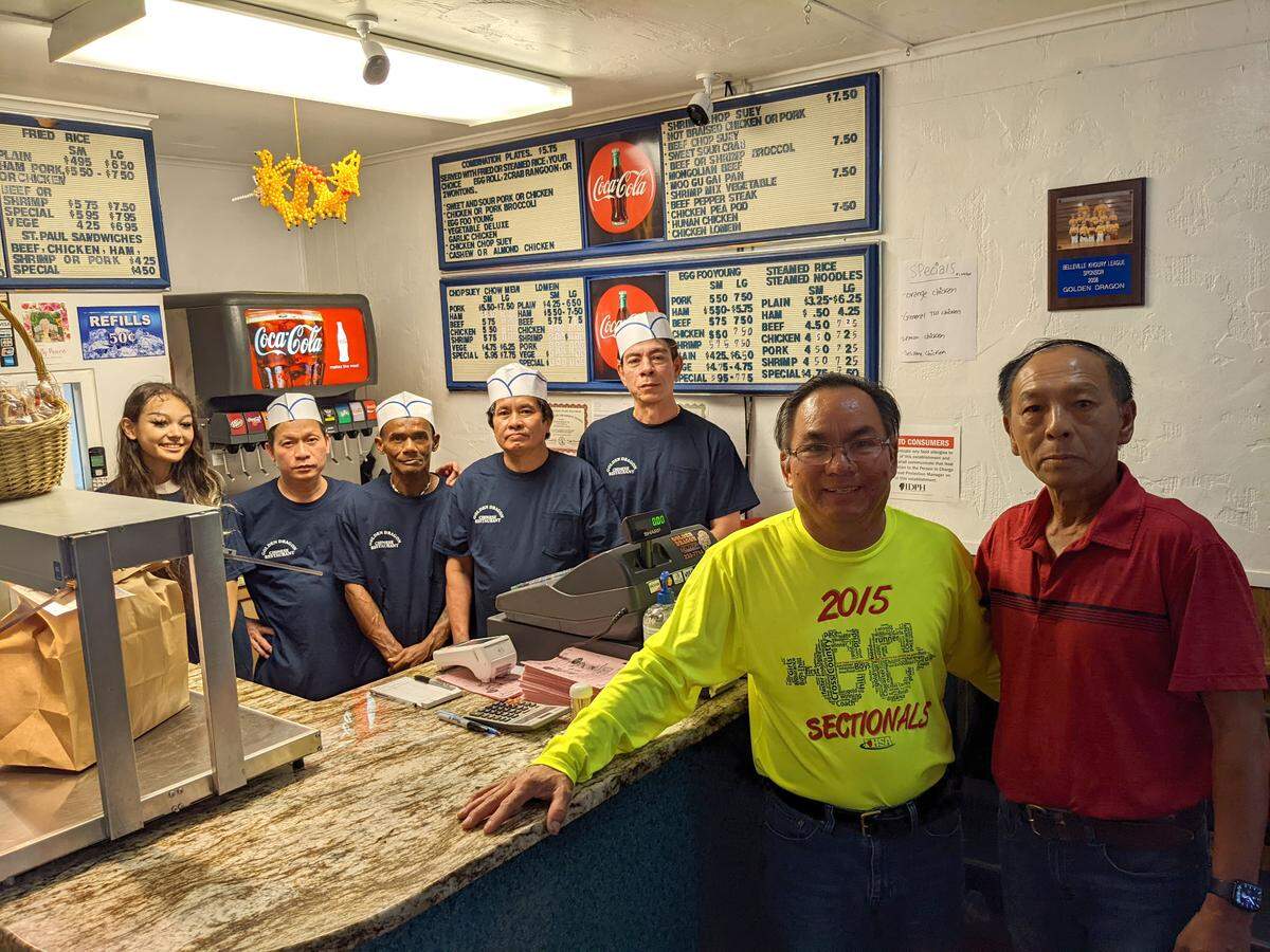 This file photo shows former Golden Dragon owner Truc Truong (second from right) and Dung Ng Phan (far right), who took over the business in 2022.