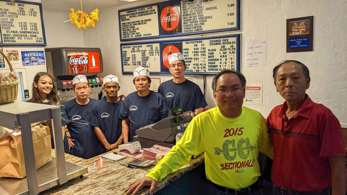 Former Golden Dragon owner Truc Truong (second from right) and new owner Dung Ng Phan (far right) with new staff members at the restaurant in downtown Belleville. Golden Dragon reopened Monday, Aug. 1, after closing earlier this year.