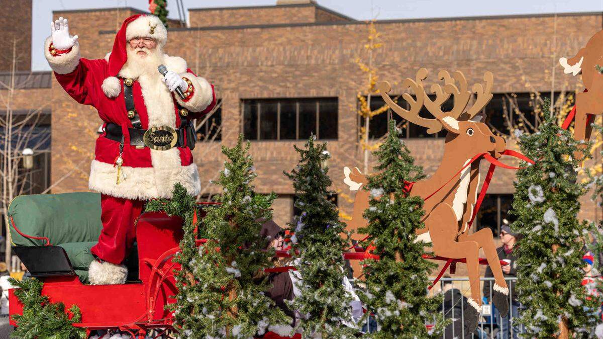 Santa Claus waves to the crowd on Belleville Public Square on Nov. 24, when the Optimist Club hosted its annual Santa Parade in downtown Belleville.