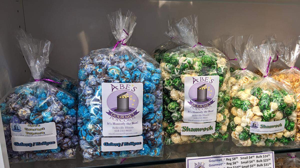 Galaxy/Eclipse and Shamrock are two popcorn flavors currently available at Abe’s in downtown Belleville.