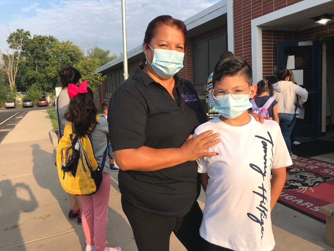 Belica Marquez is happy that her three children are back in school, including son Ruben, 10, a fourth-grader at Kreitner Elementary in Collinsville.