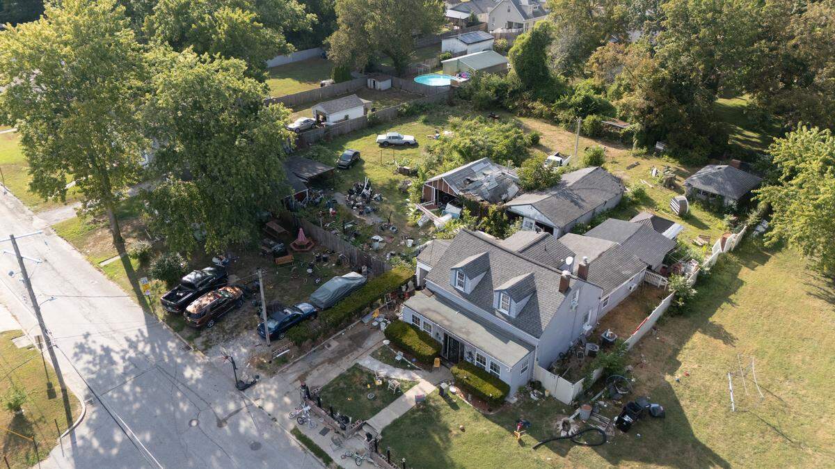 This drone photo shows three parcels of properties on South 19th Street owned by George Green, after Belleville police had seven inoperable or unlicensed vehicles towed away.