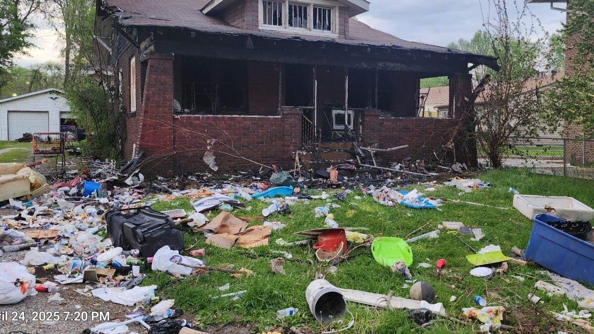 City employees cleaned up the yard at 215 S. 31st St. in Belleville several times due to complaints from neighbors before Kevin Peals was arrested in June. A fire damaged the front of the home in April.