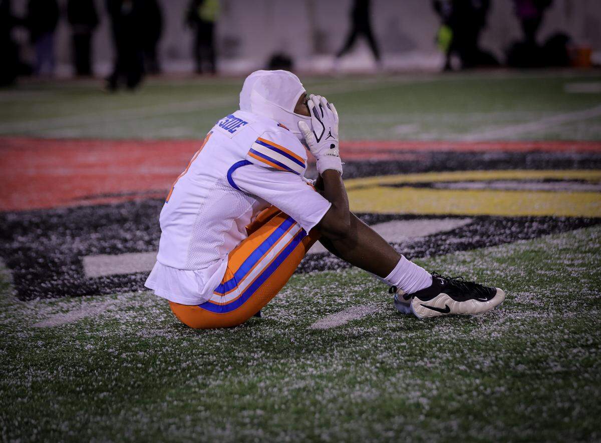 A disappointed Laron Baker Jr. after the Flyers’ 38-28 loss to Fenwick in theIHSA Class 6A championship game. 