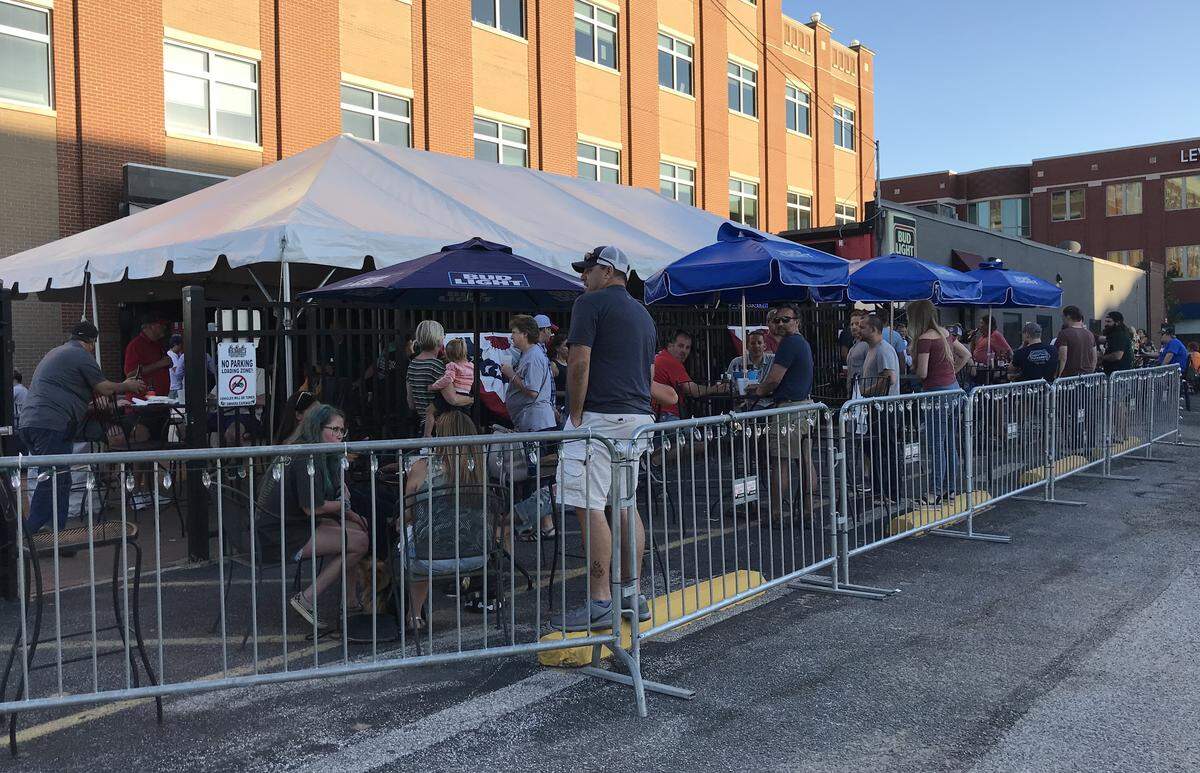 The patio at Big Daddy’s Edwardsville was crowded by 7 p.m. on Friday, the first day that restaurants and bars could offer outside dining and drinking.