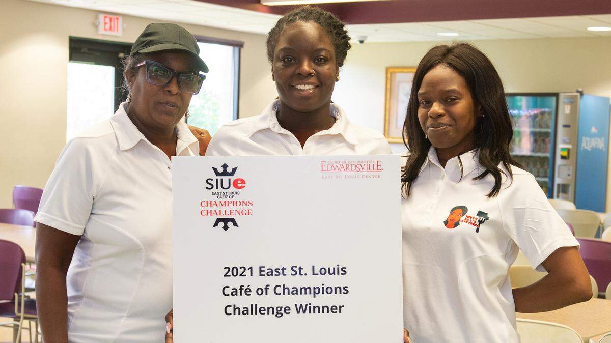 SIUE East St. Louis Café of Champions Challenge first-place winners Cynthia Richardson, Jere Richardson and Shay Jones, of Miss Jay’s Cafeteria.
