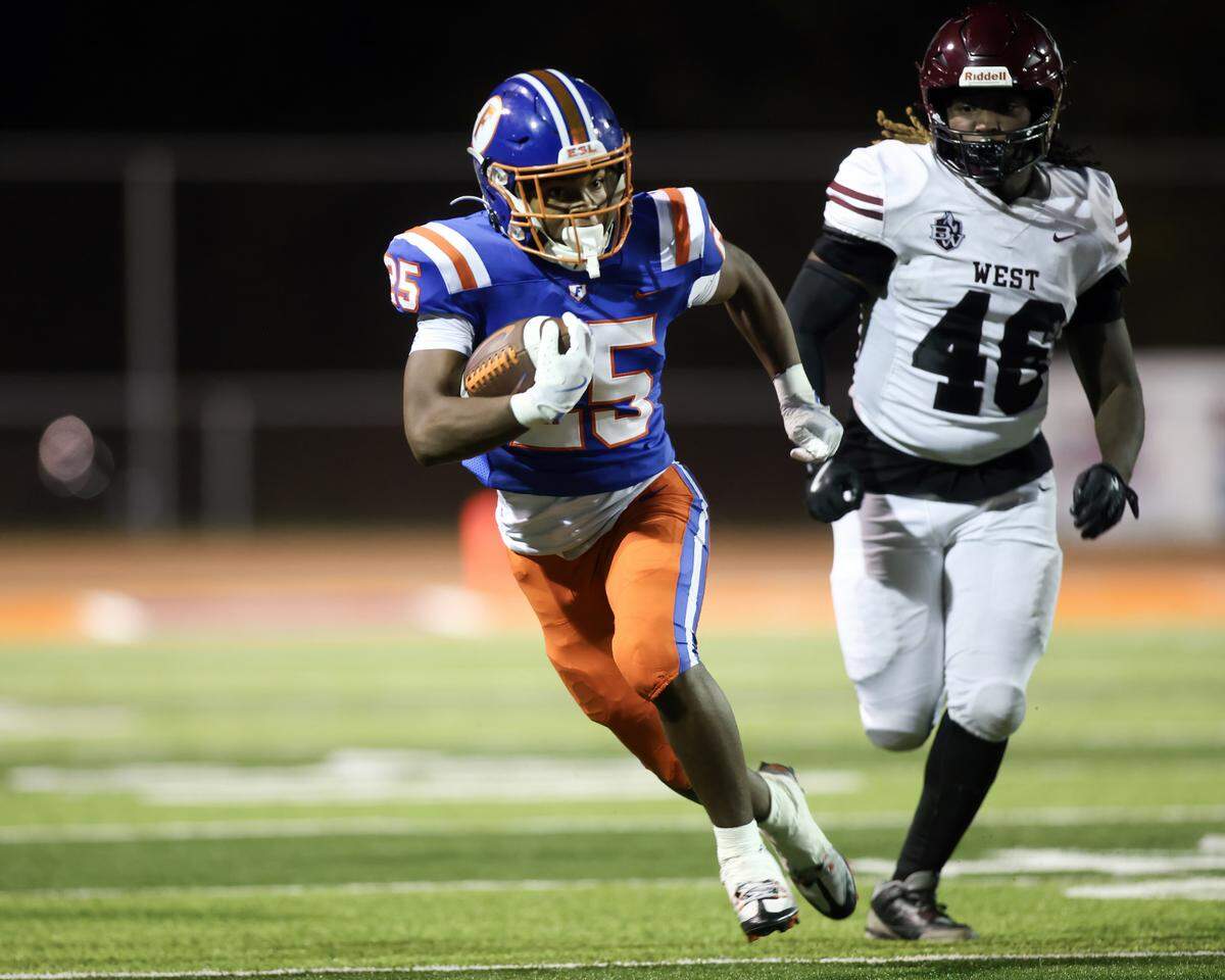 October 4, 2024 - East St. Louis Il, - East St. Louis Amir Tilman carries the ball during Friday night’s Southwestern Conference matchup between Belleville West and East St. Louis. [Photo: Chris Johns]