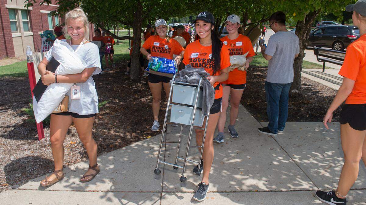 Approximately 500 student volunteers, called Movers and Shakers, along with 65 administrators, faculty and staff helped incoming Southern Illinois University Edwardsville freshmen move into residence halls Aug. 16.