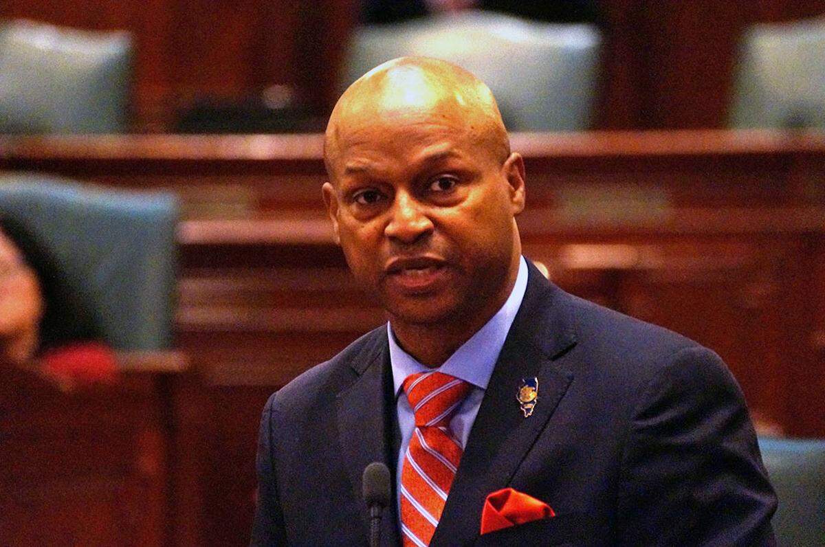 Illinois House Speaker Emanuel “Chris” Welch speaks on the House floor Wednesday as the chamber debated resolutions condemning recent executive orders and actions by President Donald Trump’s administration.
