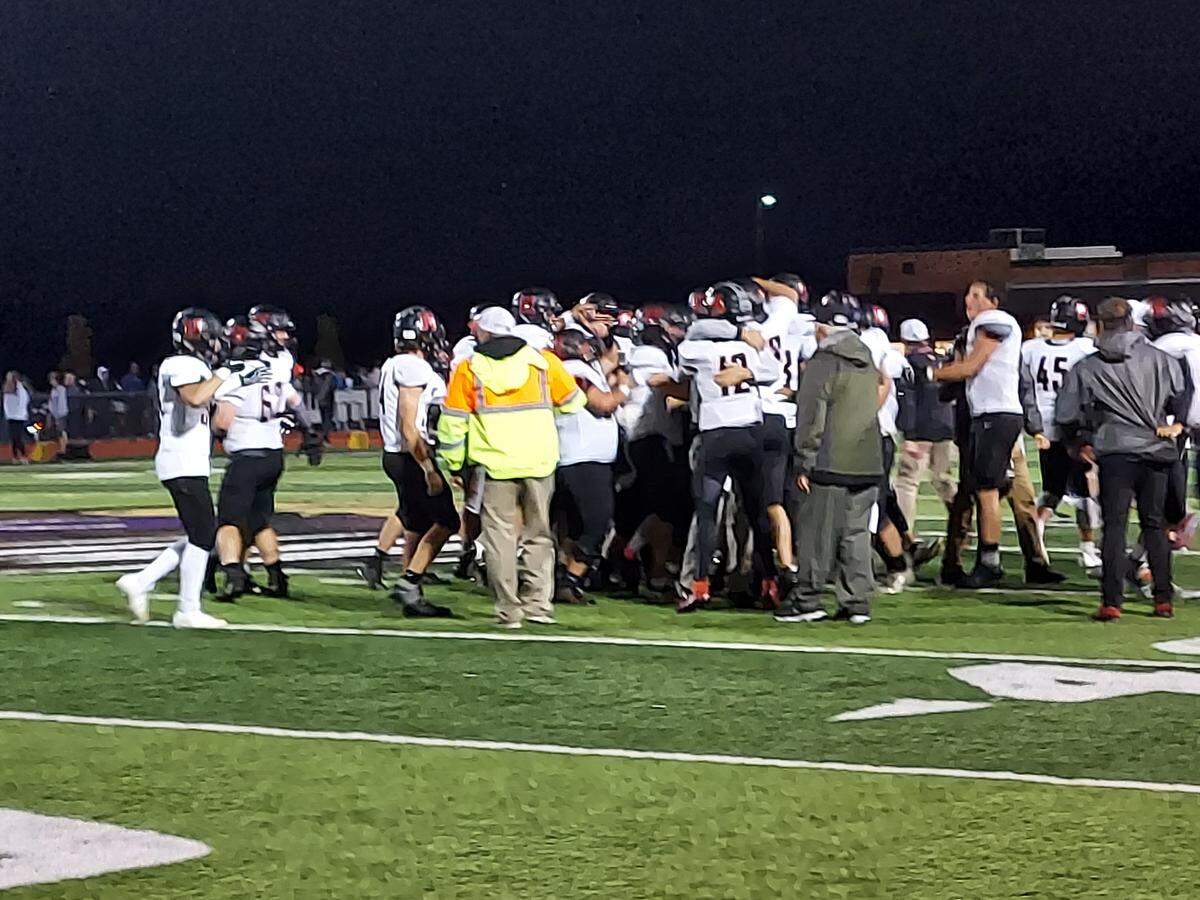 The Highland football team celebrates their 29-27 victory against Mascoutah during the 2021 campaign. The Bulldogs are now gearing up for the 2022 season with big expectations.