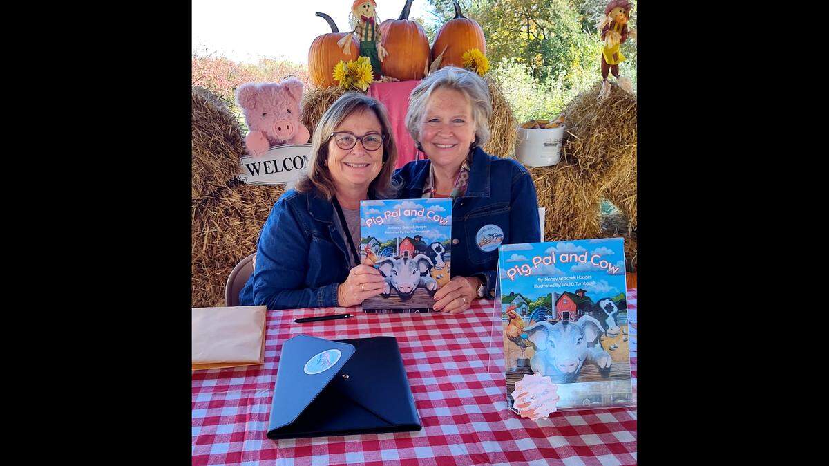 “Pig Pal and Cow” co-authors PJay Boeving (left) and Nancy Grachek Hodges