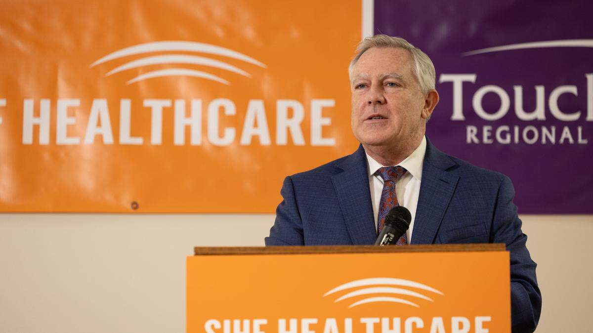 Larry McCulley, president and CEO of Southern Illinois Health Care Foundation, discusses his concerns about possible Medicaid cuts during a news conference at SIHF Cahokia Heights Health Center on Thursday.