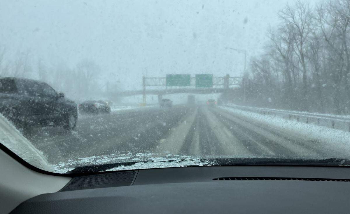 Visibility was poor on Interstate 55/70 heading east near Collinsville in the early afternoon Friday due to heavy snow, making it hard to read highway signs, including the one directing traffic to Interstate 255.
