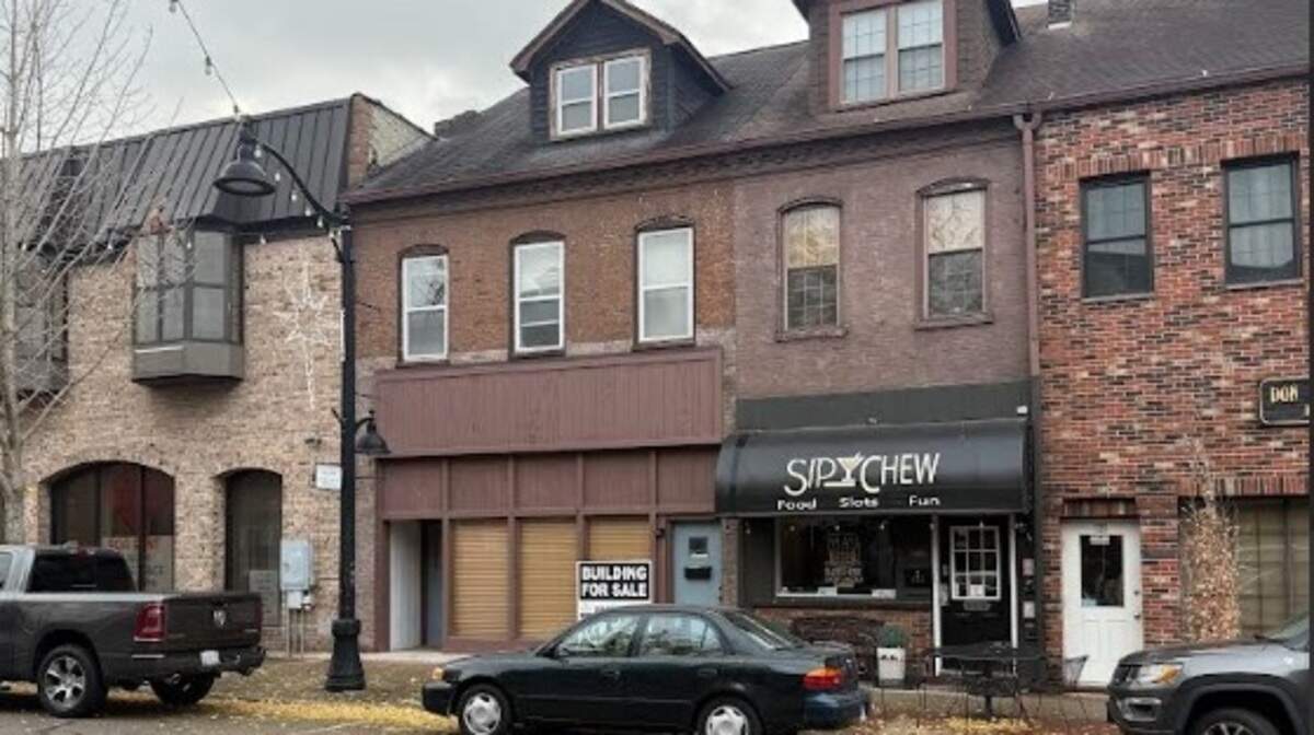 Belleville native Mark Milton, an attorney, has bought the historic storefront building at 122 W. Main St., which is left of the Sip & Chew restaurant in this photo. He plans to operate a satellite office in it.