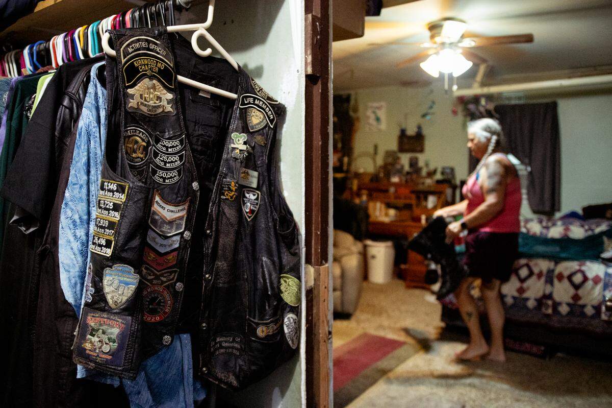 A retired vest hangs outside Tina Weber’s room on Sunday, July 14, 2024, at her home in Collinsville, Illinois.