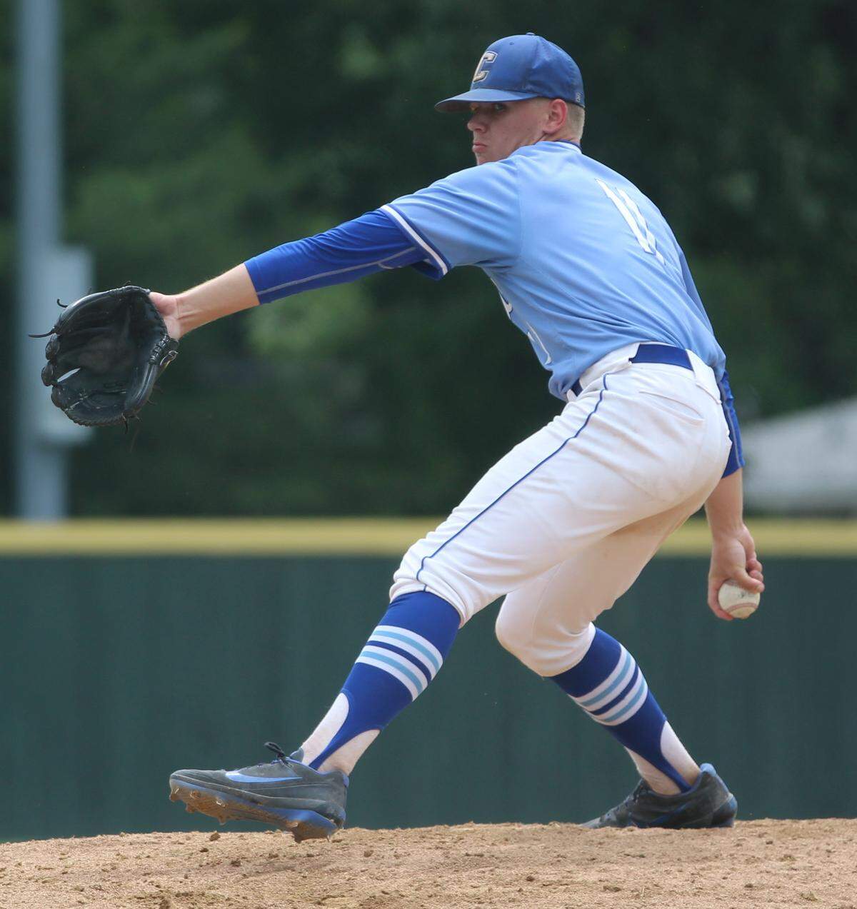 Columbia senior pitcher Shane Wilhelm delivers against Triad in the Class 3A Centralia Sectional championship game Saturday.