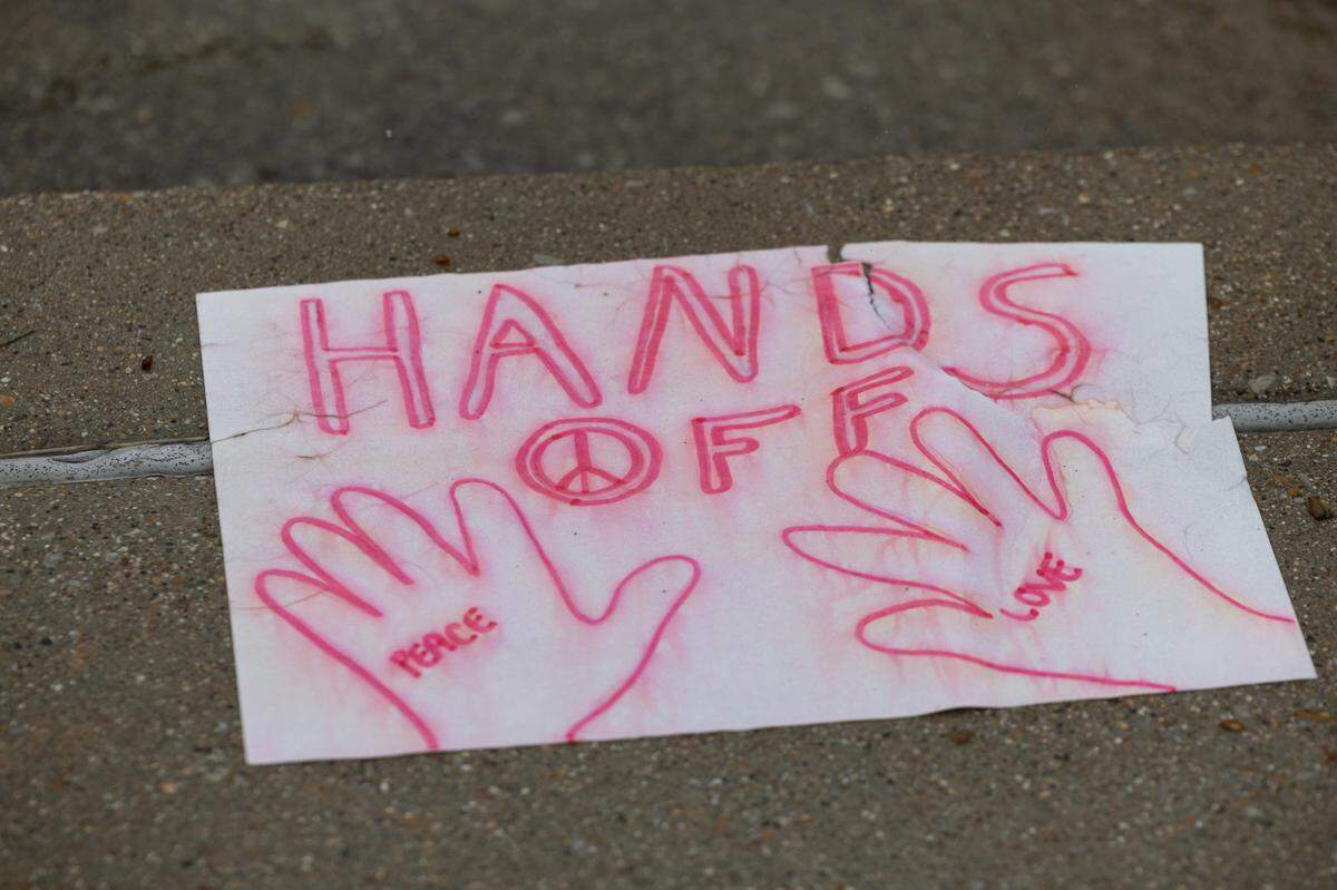 A soaked sign during Saturday’s protest on Belleville’s Public Square Saturday.
