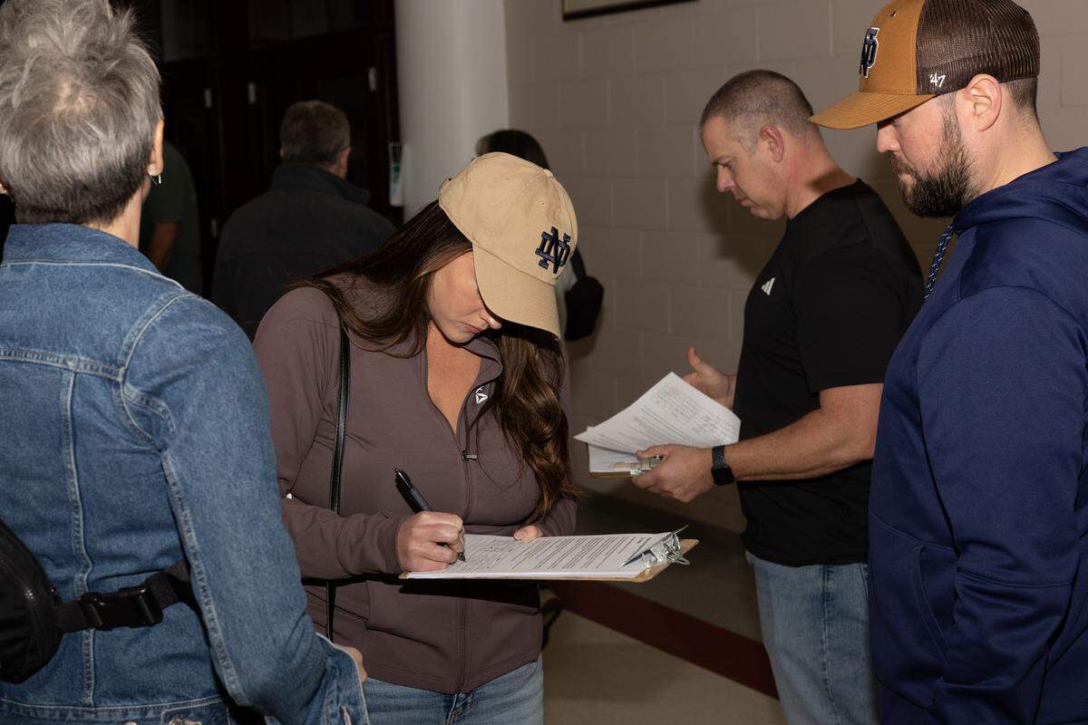 Before a question-and-answer forum about a possible data center development in Troy, residents gathered signatures on two separate petitions. One petition calls for the prohibition of data centers in Troy and another asks the City Council not to renew City Administrator Jay Keeven’s contract because of the development talks.