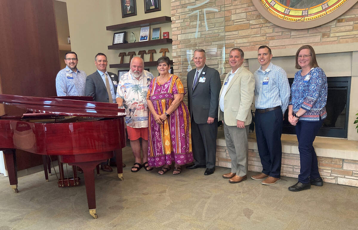 HSHS St. Joseph’s Hospital Highland recently accepted the gift of a grand piano from John and Cindy Ludwig. Shown by the piano at a recent brief ceremony are (left to right): Jed Driemeyer, director of human resources; Chris Klay, president and CEO; John and Cindy Ludwig; Dave Garris, director of philanthropy; Dr. Dennis Szurkus, chief medical officer; Mark Ennen, director of financial operations; and Teri Mustain, executive assistant.