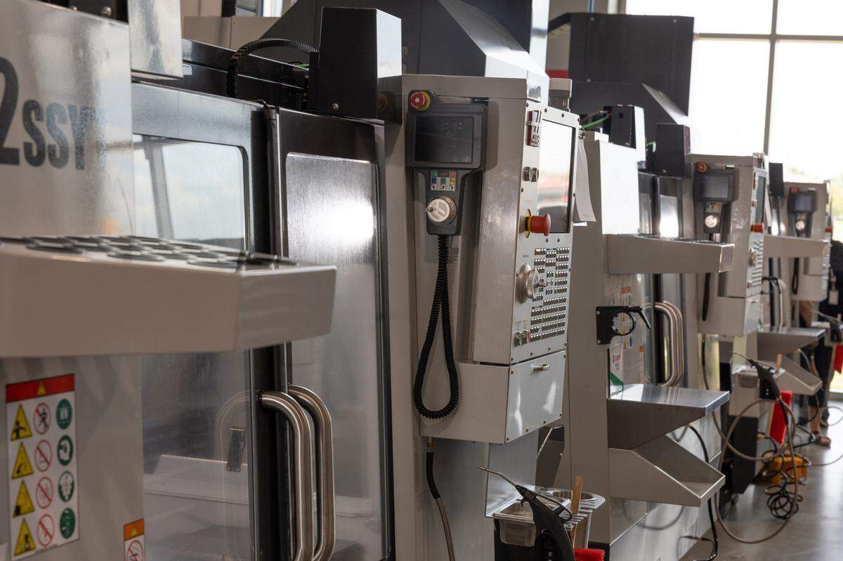 Computer numerical control machines at Southwestern Illinois College’s new manufacturing training academy in Belleville, Ill., on July 11, 2024.